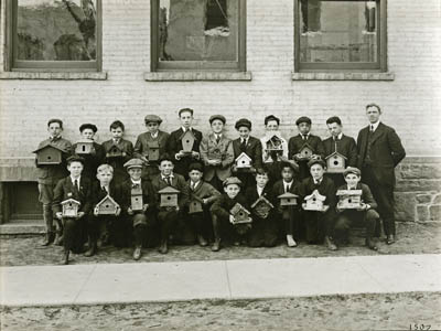 Children with birdhouses made for public school birdhouse contest, 1918 (PBP- 1507)